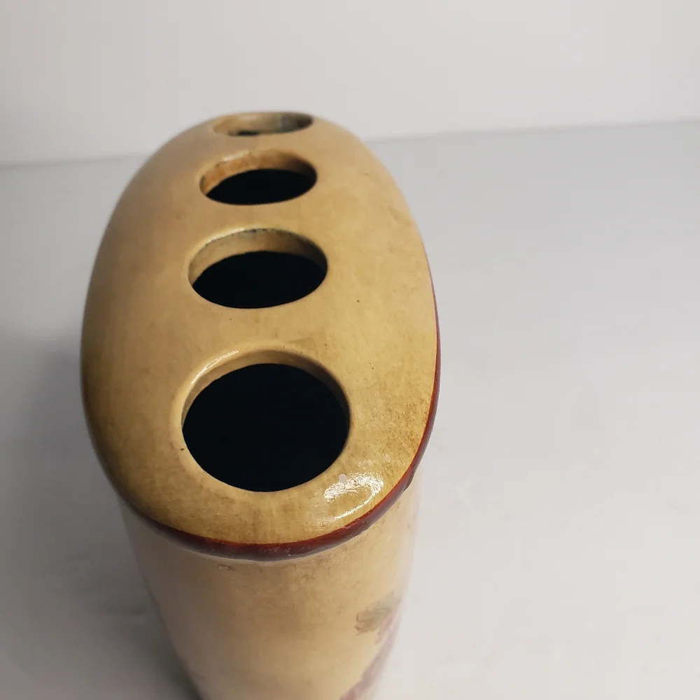Vintage toothbrush holder. 176